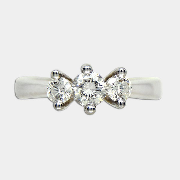 Elegant Three Diamond Ring