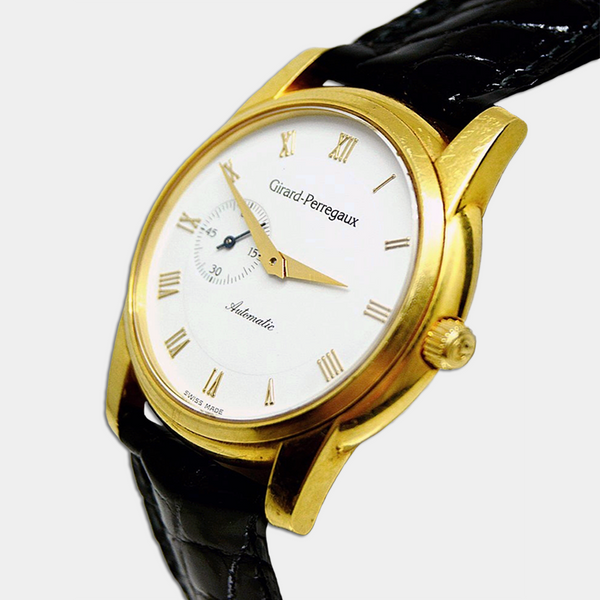 Gold Girard-Perregaux Watch